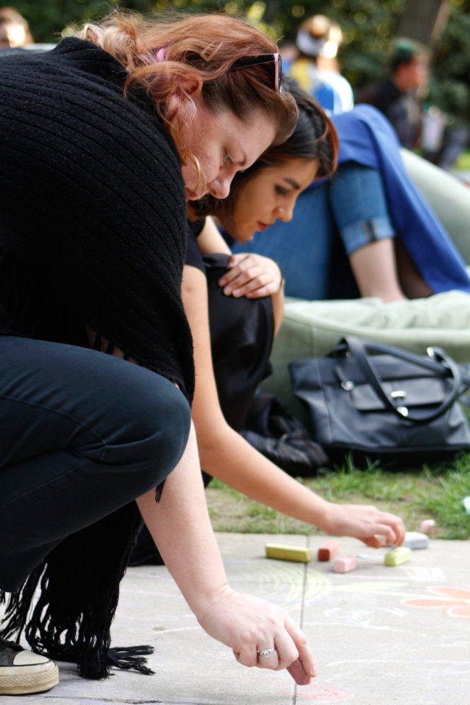 M. G. (left) with Sarai (right) at the Johnston Center's Johnny Cash Day musical festival, fall 2014. Photo by Caillie Roach. 